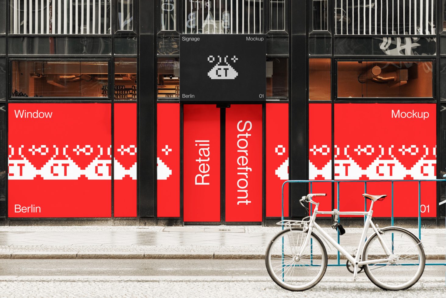 Retail storefront mockup with pixel art design elements in windows, bike parked outside, urban setting for graphic designers.